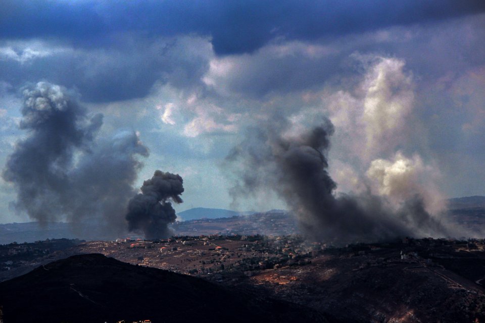 Smoke from heavy Israeli air raids billows from the southern Lebanese village of Taibeh