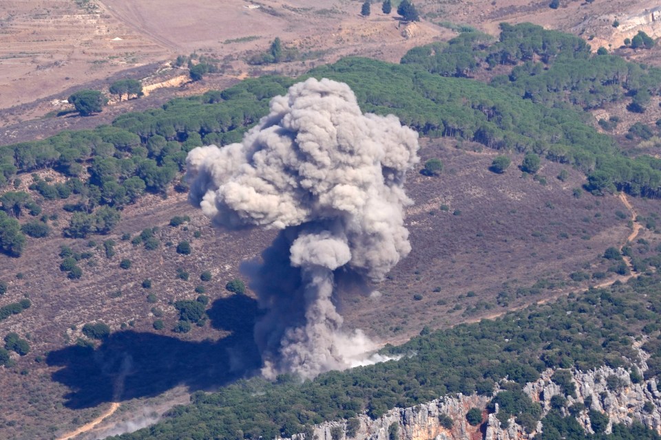 Smoke rises from an Israeli airstrike on Mahmoudieh mountain