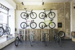 Save Assortment of racing cycles in a custom-made bicycle store - stock photo