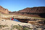 El Muweilih Crater, a maar in Bayuda volcanic field, Sudan:[20] Natron-rich clay on the crater floor