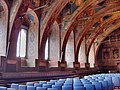 The 16th-century seats along the perimeter of the room