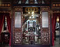 Image 46Inside the former house of a Peranakan (Baba-Nyonya or 峇峇娘惹) in Malacca which has now been converted into a museum, a Nyonya can be seen sitting inside wearing the traditional kebaya. (from Malaysian Chinese)