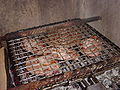 Image 11Meat on a traditional South African braai (from Culture of South Africa)