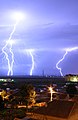 Image 5Cloud-to-ground lightning. Typically, lightning discharges 30,000 amperes, at up to 100 million volts, and emits light, radio waves, x-rays and even gamma rays. Plasma temperatures in lightning can approach 28,000 kelvins. (from Atmospheric electricity)