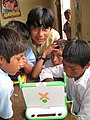 Image 5Peruvian school children with an OLPC XO-1 laptop (from Demographics of Peru)