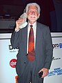 Image 50Martin Cooper of Motorola, shown here in a 2007 reenactment, made the first publicized handheld mobile phone call on a prototype DynaTAC model on 3 April 1973. (from Mobile phone)