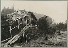 An old photo of a dilapidated cabin belonging to Salmon Bay Charlie