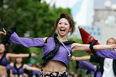 Japanese women performing a traditional Japanese dance Yosakoi in navel-exposing attire in the Yosakoi Matsuri 2006 at Kōchi