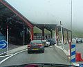 Border post between France and Andorra, a microstate that de facto follows Schengen immigration policies and utilises the Euro as its national currency yet is not a part of the European Union VAT and customs areas.