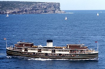 Crossing Sydney Heads with North Head in the background. As a Brambles Limited ferry, 1974.