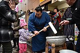 「木瀬部屋力士衆による もちつき即売会」笹塚十号通り商店街（2019年2月撮影）