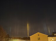 Light pillars during a winter night in Stockholm, Sweden.