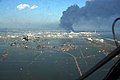 Incendi dins lo pòrt japonés de Sendai après lo tèrratrem de 2011.