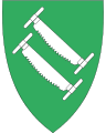 3423 Stor-Elvdal I grønt to skråstilte sølv tømmersager [299] Skogsbrukskommune.