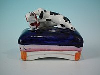 Small staffordshire pottery figure of inkwell 2.1ins tall dogs on cushion, circa 1860