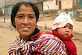 Image 31Amerindian woman with child (from Demographics of Peru)