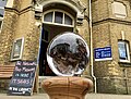 Lion poo in a resin sphere outside Sandown Library