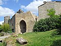 Teilrestauriertes Südtor / Portal d’Abal (außerorts)