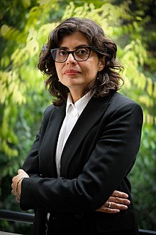 Portrait picture of a latina woman in a business suit