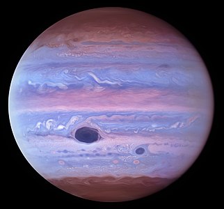 Ultravioletfoto van Jupiter, op 11 Januarie 2017 deur Hubble afgeneem.[192]