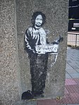 Charles Manson i en fängelseklädsel som liftar till "vart som helst", Archway, London.