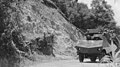 KNIL forces patrolling in Samarinda with Braat Overvalwagen, April 1948.