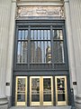 London Guarantee Building with large relief above the entrance commemorating Fort Dearborn