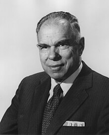 Picture of an elderly man in a suit facing the left to the viewer.