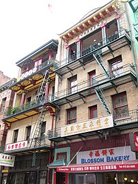 Tin How Temple (left building, top floor)