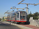 A Muni Metro train crossing over San Francisco's Islais Creek Channel