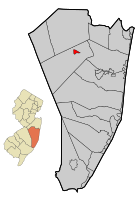 Location of Lakehurst in Ocean County highlighted in red (right). Inset map: Location of Ocean County in New Jersey highlighted in orange (left).