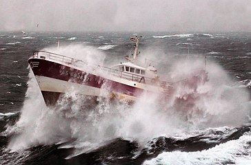 A French fishing vessel during a storm in the Irish Sea. The crew of a Royal Navy vessel rushed to the aid of an injured fisherman on the boat trapped by bad weather on the Irish Sea.