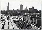 Late 1960s view from the north, with the elevated Central Artery at left. What remains of Haymarket Square is the traffic circle at the center.