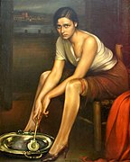 Inclinada sobre el brasero, removiendo el picón con la badila: La chiquita piconera (1930), uno de los últimos óleos de Julio Romero de Torres.