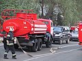 Fire engines and emergency service personnel responding to an incident in Kyiv, 2010