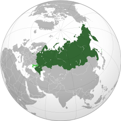 Russia on the globe. Disputed lands are shown in light green.[a]