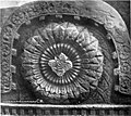 Pauni Carved medallion on coping.