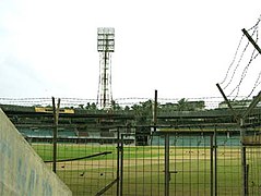 Before renovation - stands, floodlight tower from a spectator view from one of the stands.