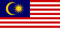 Bendera Malaysia memiliki kanton biru dengan bulan sabit dan bintang bersudut empat belas berwarna kuning.