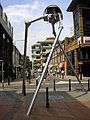 Image 71Statue of a tripod from The War of the Worlds in Woking, England, the hometown of author H. G. Wells. The book is a seminal depiction of a conflict between mankind and an extraterrestrial race. (from Culture of the United Kingdom)