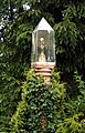 Monument with a Monstrance in Rybnik, Poland in front of the Church of St. Laurence