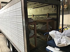 Deceased in New Jersey being loaded into a makeshift morgue.