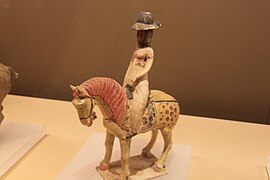 Woman rider wearing a tanling ruqun and a humao, Horse and female rider, Tang dynasty.: 291