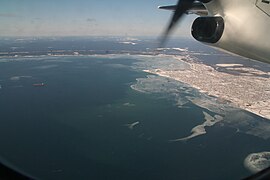 Aerial view, bay of Sept Îles, port[12] and city of Sept-Îles