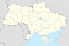 Mapa konturowa Ukrainy, u góry nieco na prawo znajduje się punkt z opisem „Komysznia”