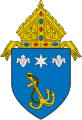 The arms of the Archdiocese of Anchorage: The anchor references the namesake of the see, Anchorage, Alaska.