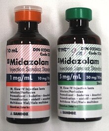 Two 10-ml bottles labeled Midazolam. The bottle on the left has a label in red and says 1 mg/ml; the one on the right is in green and says 5 mg/ml. Both bottles have much fine print.