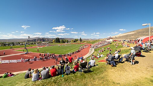 Fans watch a football game at Mountaineer Bowl