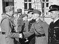 Finnish soldiers wearing field caps based on the German pattern, 1942.