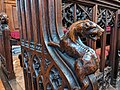 Detail of a pew around the altar.